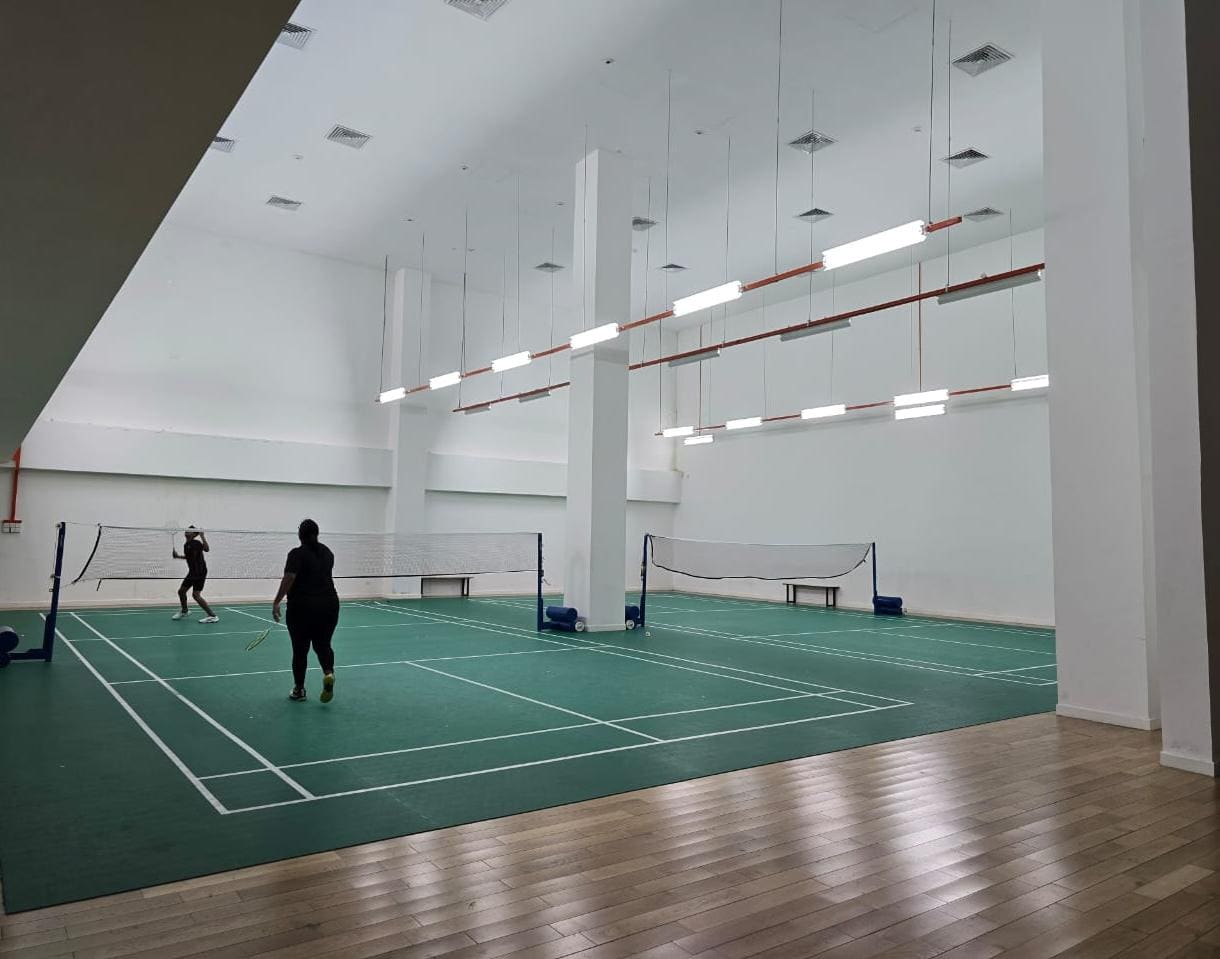 Indoor badminton court in the 70,000 sq ft indoor facilities at Cappella Embassy, Ampang Hilir — photograph