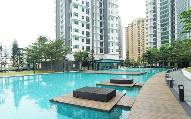 The resort-length swimming pool at Cappella Embassy with floating timber sun-deck islands, Ampang Hilir — photograph